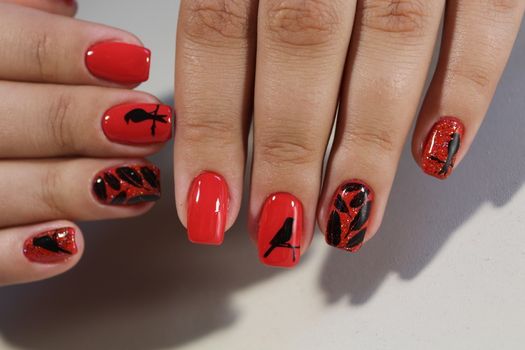 Manicure design red nails with a pattern