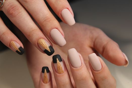 beautiful female hands with sexy manicure design.