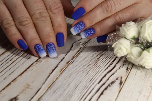 Close up on beautiful female hands with sexy manicure.