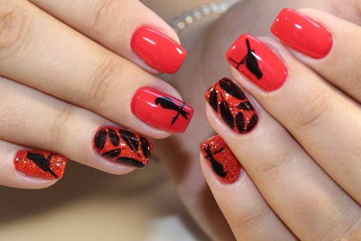 Manicure design red nails with a pattern