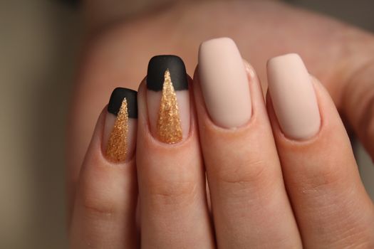 Perfect manicure and natural nails. Attractive modern nail art design. Gel polish applied.