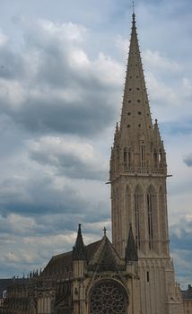 View from fortress on tall Catholic cathedral in Caen, France