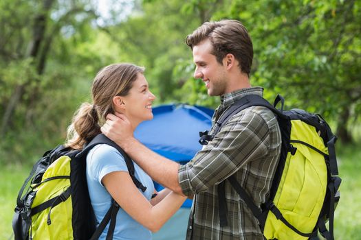 Side view of romantic couple looking at each other at campaing