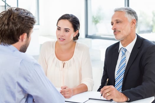 Business colleagues discussing during meeting in office