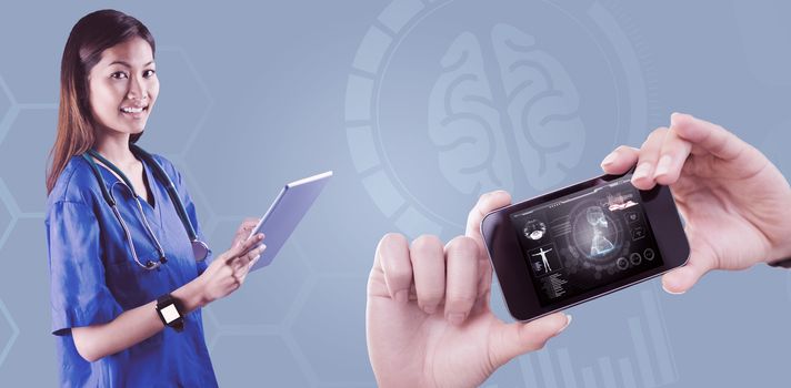 Asian nurse using tablet against medical biology interface in black