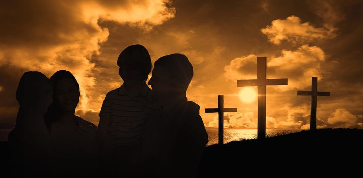 Mother and father carrying children over white background against cross religion symbol shape over sunset sky 