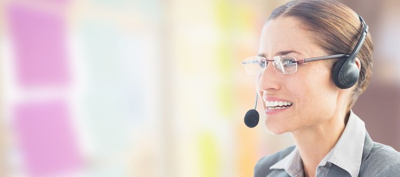 Businesswoman wearing headset against colorful adhesive notes 