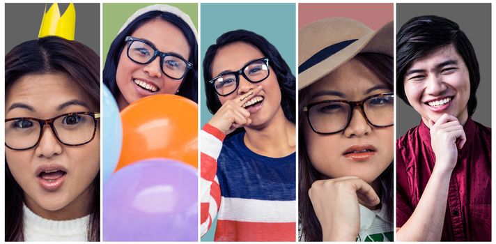 Composite image of asian woman with paper crown posing for the camera