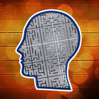Maze brain in head against wooden surface with planks