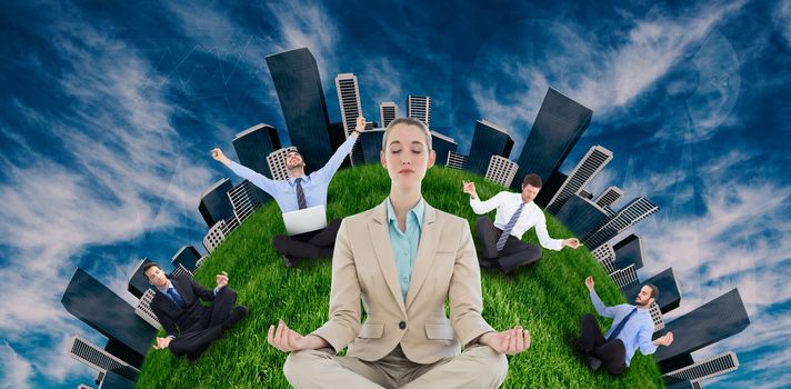 Businesswoman sitting in lotus position against view of the blue sky