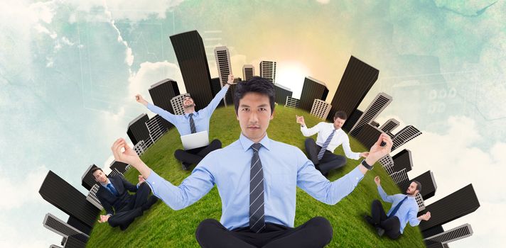 Asian businessman doing yoga against green and blue sky