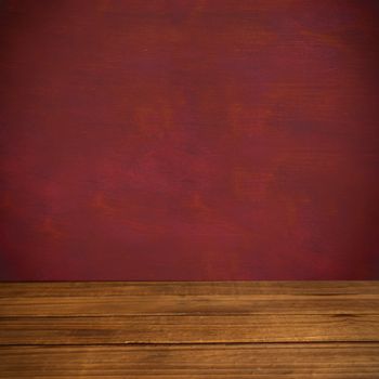 Close-up of hardwood floor against desk