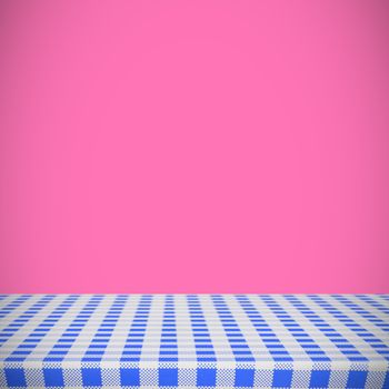 Blue and white tablecloth against pink background