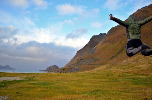 Hiker makes his freedom jump on Haukland Beach