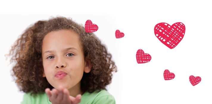 Red Hearts against a child blowing a kiss air