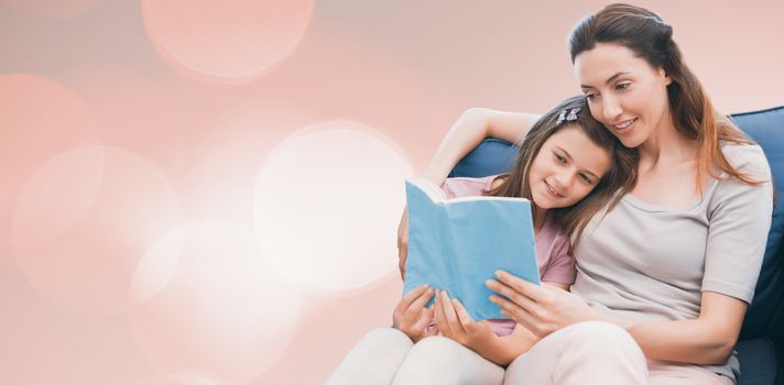 Background of multiple color against mother and daughter reading a book