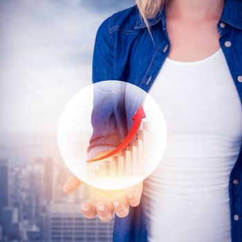 Woman presenting her hands  against room with large window looking on city