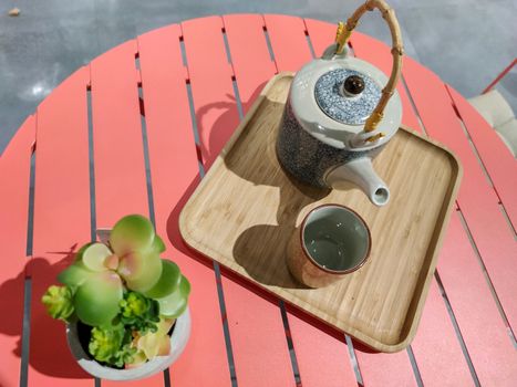 tee tray on a beautiful orange table