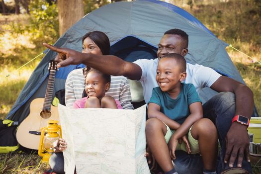 Happy family enjoying together at park