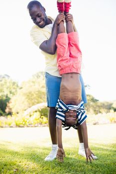 Happy family enjoying together at park