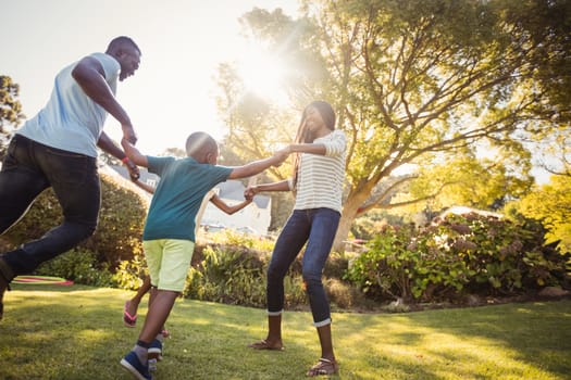 Happy family enjoying together at park