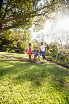 Happy family posing together at park