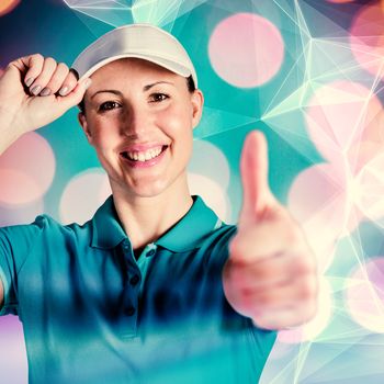 Sportswoman posing on black background against abstract black background