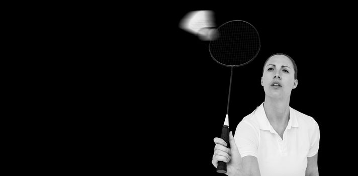 Female player playing badminton on white background