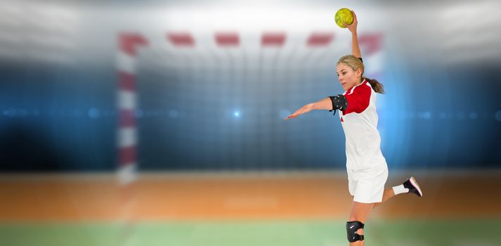 Sportswoman throwing a ball against digital image of handball goal 