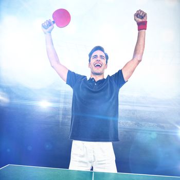 Happy male athlete posing after victory against american football arena