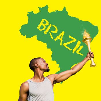 Front view of sportsman holding a cup  against green brazil outline on yellow with text