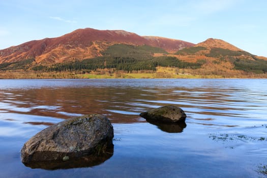 The view across Bassenthwaite Lake in the English Lake District National Park with Skiddaw mountain in the background.  Skiddaw is the fourth highest mountain in England.