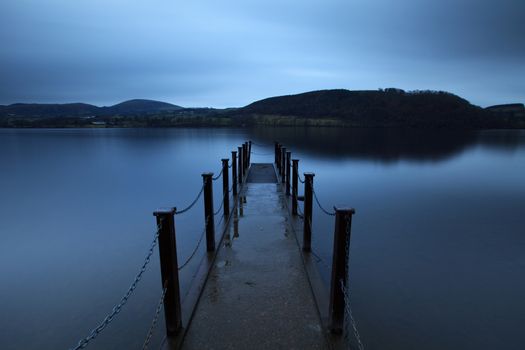 The pier is a landing stage on the banks of Ullswater, Cumbria in the English Lake District national park.