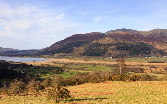 A view of Bassenthwaite lake in the English Lake District national park with Skiddaw mountain in the background.  Skiddaw is the fourth highest mountain in England.