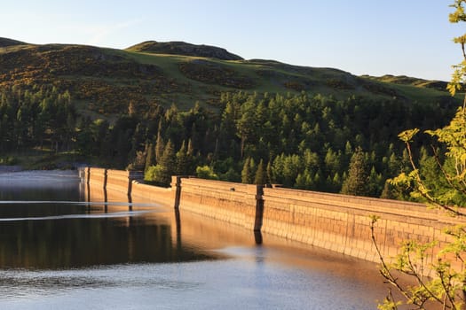 Haweswater reservoir and dam lie in the English Lake District National Park.  Construction of the dam began in 1929 and the reservoir now supplies water to the city of Manchester.