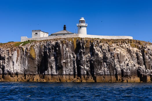 This lighthouse is situated on the Inner Farne Islands on the Northumberland Coast in Northern England.