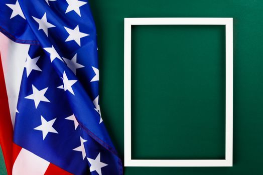 President's Day Concept, flat lay top view, America Flag and photo frame on Olive green background with copy space for your text