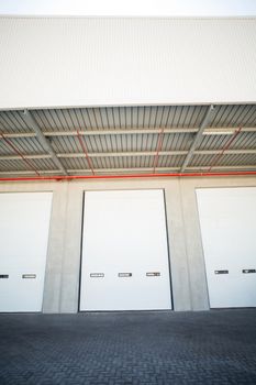 View of warehouse gates on a sunny day 