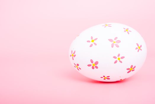 Beautiful Easter White egg color on pink background, Easter day concept