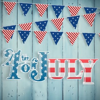 Independence day graphic against wooden planks