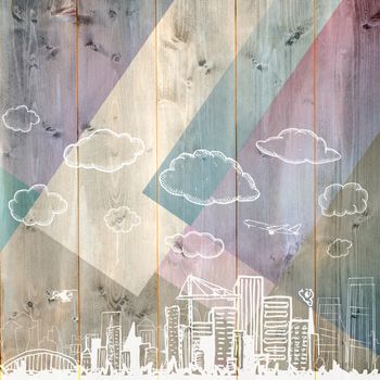 Cityscape doodle against colored wood
