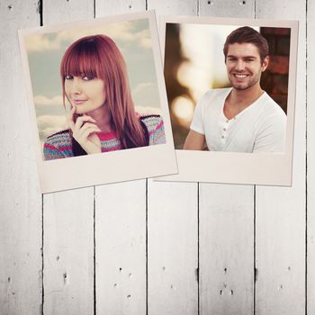 Portrait of a smiling hipster woman against white wood