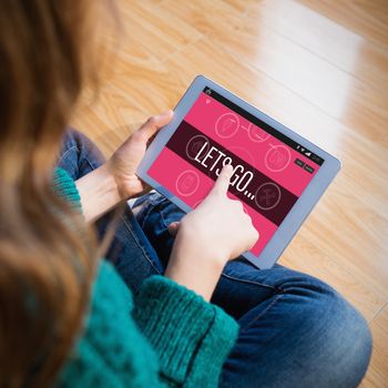 Smartphone apps icons against woman sitting on the floor while using her tablet