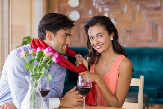 Romantic couple having fun together in restaurant