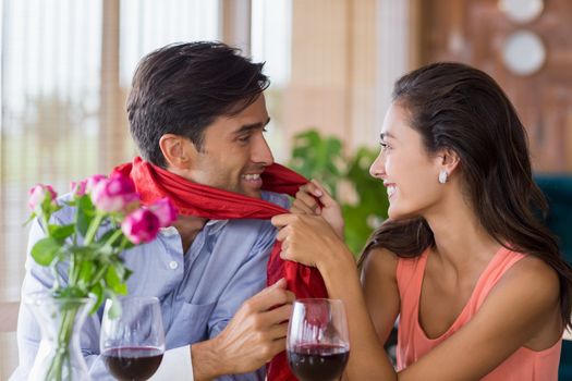 Romantic couple having fun together in restaurant