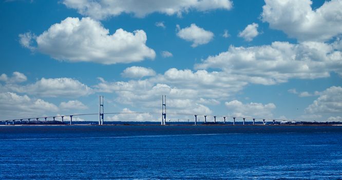 A suspension bridge over a channel in the bay