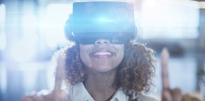 Woman wearing virtual reality glass in office