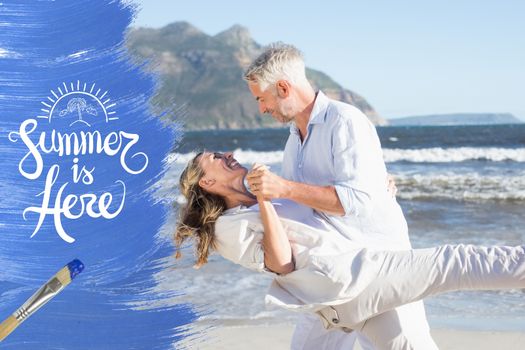 Couple dancing on the beach on a summer day