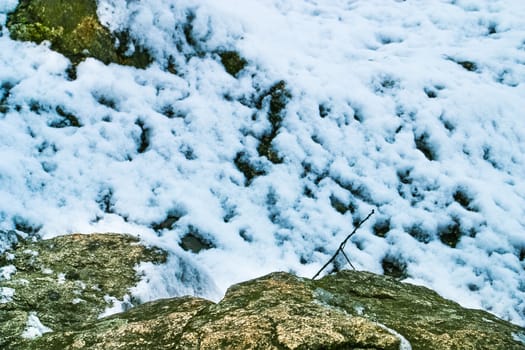 hillside covered with snow in winter seasonal landscape