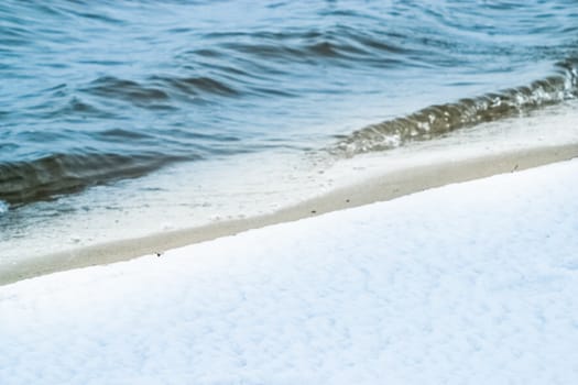 Shore of the river in winter seasonal landscape